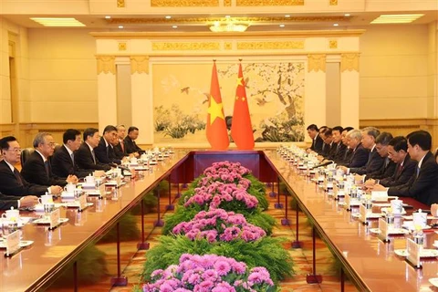 Entrevue entre le secrétaire général et président vietnamien Tô Lâm et le président de la Conférence consultative politique du peuple chinois, Wang Huning, à Pékin, le 19 août. Photo: VNA