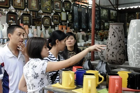 Customers at the traditional Bat Trang ceramic village. 