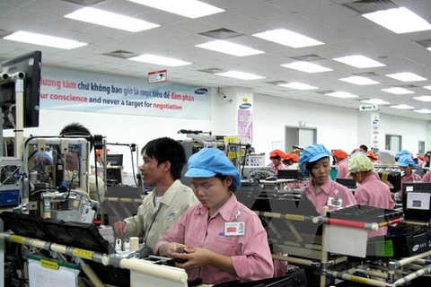 At Samsung Electronics factory in Thai Nguyen Province, Vietnam. (Photo: VNA)