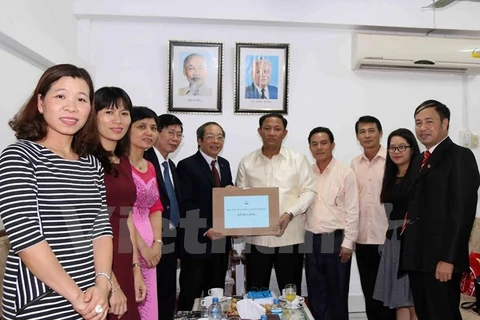 Vietnam, Laos boost press cooperation