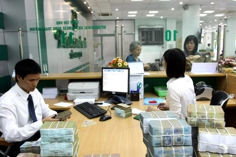 Some banks raise rates on Vietnamese dong deposits