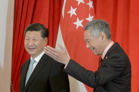 Singapore, China vow to promote bilateral ties 