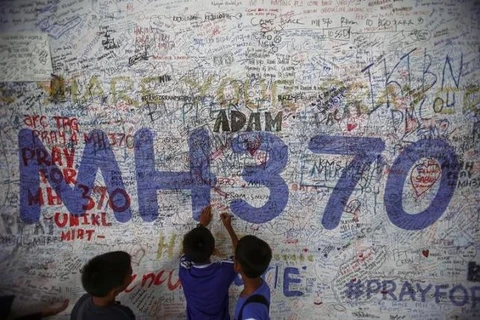 No answers in interim report on missing MH370 