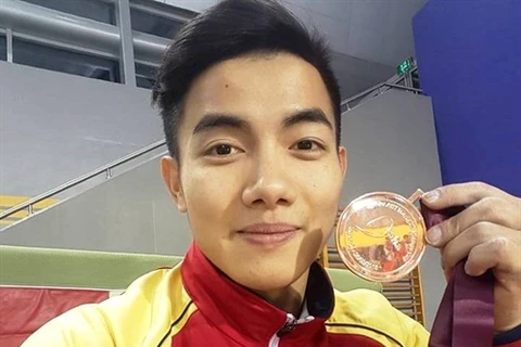 Hung wins parallel bars bronze at Doha Gymnastics World Cup 