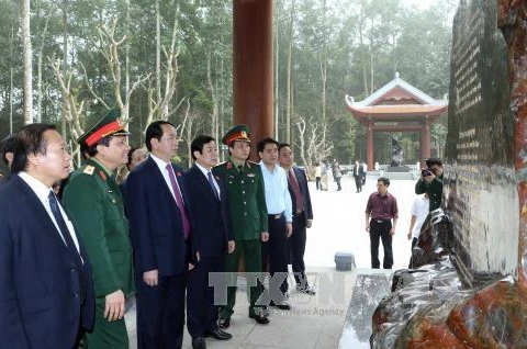 President Tran Dai Quang visits K9-Da Chong historic site