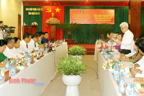Binh Phuoc, Lao province step up cooperation