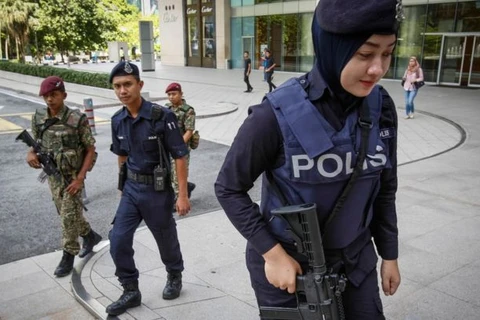 Three Malaysians charged for terrorist links