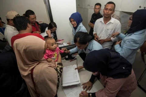 Indonesia begins re-vaccination for children amidst fake vaccine