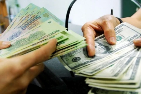Reference exchange rate goes down by 9 VND