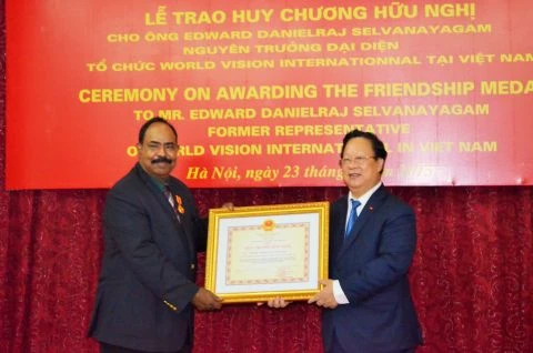 Former World Vision national director receives Friendship Medal
