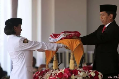 Indonesia's original national flag paraded for first time 