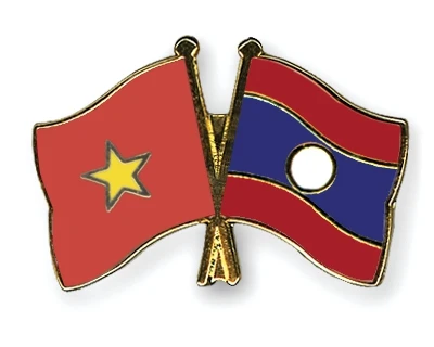 Vietnam, Laos exchange mass mobilisation experience