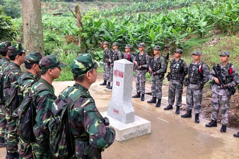 Vietnam, Laos reinforce cooperation in border security 