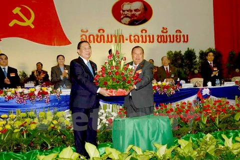 Party chief congratulates his new Lao counterpart