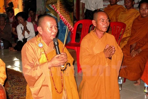OVs in Cambodia offer incense to martyrs 