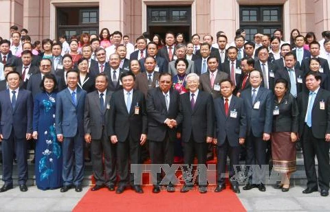 Lao top leader visits HCM National Academy of Politics 
