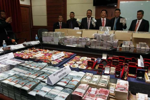Malaysia seizes biggest-ever corruption cash