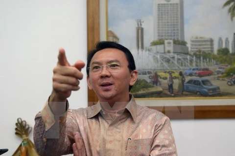 Jakarta governor declared suspect in blasphemy case