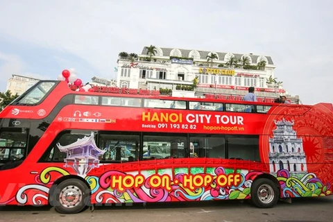 Hanoi's double-storey bus service thrills tourists