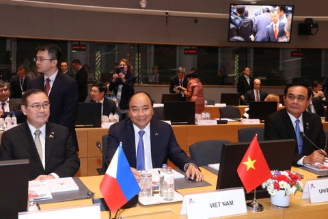 PM attends 12th ASEM Summit's opening ceremony