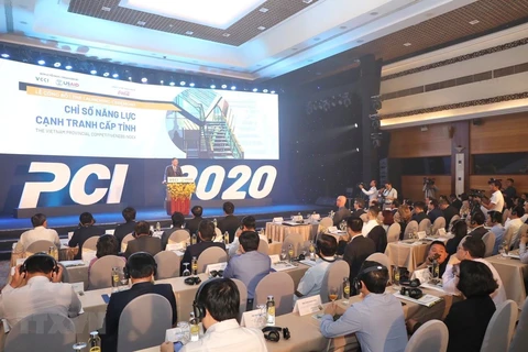 A ceremony held to announce the 2020 Provincial Competitiveness Index (PCI) on April 15. (Photo: VNA)