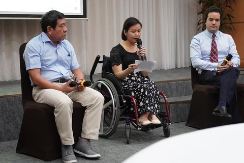 Speakers discuss the monitoring of the implementation of Article 27 of the Convention on the Rights of Persons with Disabilities (CRPD) in Vietnam at a consultation workshop on April 5. (Photo: VietnamPlus)