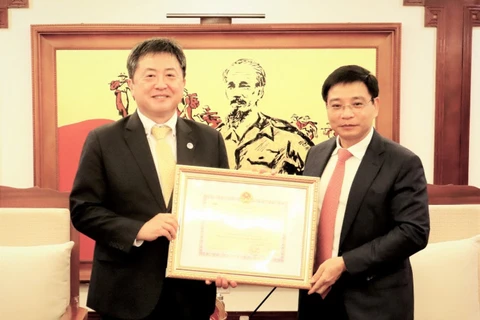 JICA Chief Representative honoured with insignia