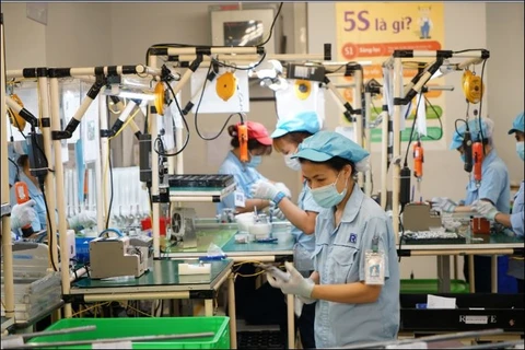 Hanoi seeks to improve role of manufacturing, processing