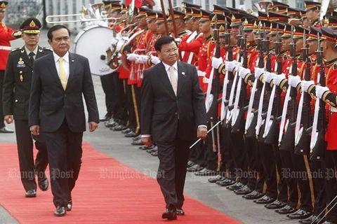 Thailand, Laos tighten bilateral ties