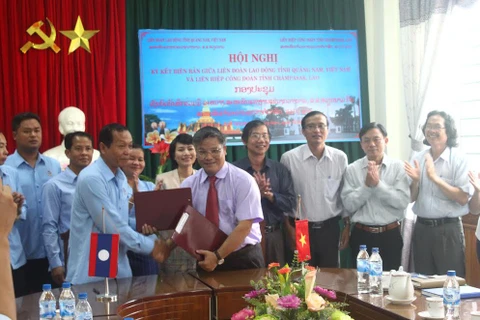 Vietnam, Lao localities boost trade union links 