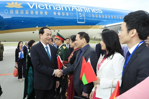 President Tran Dai Quang begins official trip to Belarus