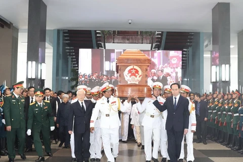 Memorial, burial services held for former PM Phan Van Khai