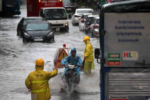 Incessant rains leave Hanoi streets under water