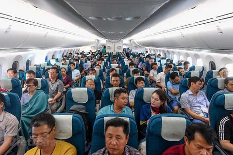 Passengers on first Boeing 787-10 commercial flight of Vietnam Airlines. (Photo: VietnamPlus)