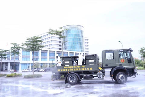 Army disinfect COVID-19 hit hospital in Hanoi