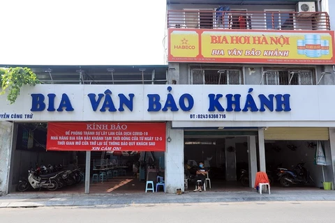 Hanoi closing beer clubs to fight COVID-19