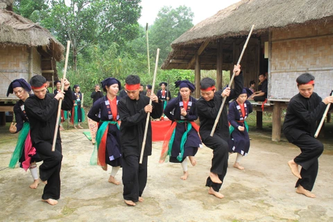 San Chay ethnic people perform folk dance to welcome harvest festival