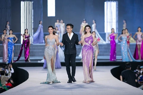 Beauty queens pose on the catwalk of the Vietnam Beauty Fashion Fest