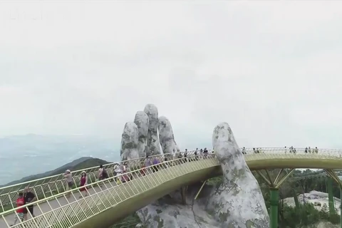 A walk on clouds at Golden Bridge on Ba Na Hills