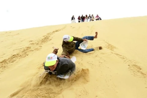 Great fun sand boarding in Nui Ne