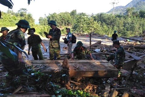 Rescuers work non-stop in search for landslide victims