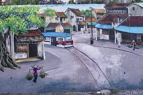 Murals beautify old dyke in Hanoi