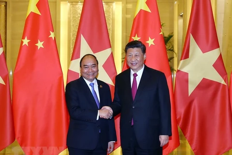 Prime Minister Phuc active in China
