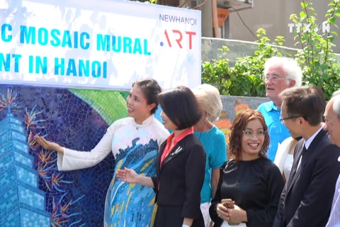 Ceramic mosaic mural promotes friendship 