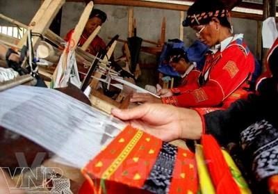 Ethnic women uphold traditional brocade weaving
