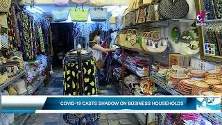 COVID-19 casts shadow on business households