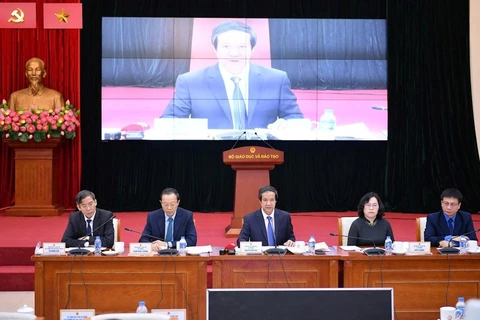 Minister of Education and Training Nguyen Kim Son at a meeting held in both in-person and online formats with 700,000 teachers, administrators and school staff nationwide (Photo: VietnamPlus)