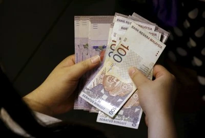 Malaysia launches measures to protect domestic currency