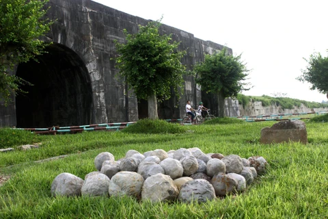 Exhibition spotlights Ho Citadel archeological excavations