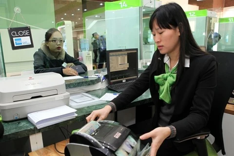 Vietcombank posts record high pre-tax profit for 2016